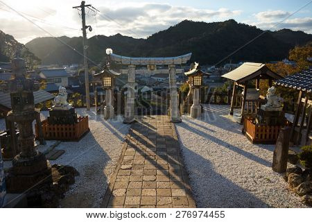 Arita, Japan - October 30, 2018: View from the Tozan shrine in Arita to the village and mountains in autumn at dusk