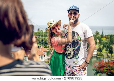 Bali, Indonesia - December 29, 2018: Young Couple At Taman Ujung Water Palace.