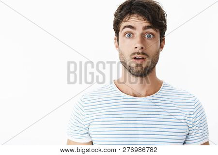 Surprised Handsome Hispanic Bearded Man Getting Amazing News Opening Mouth From Amazement Raising Ey