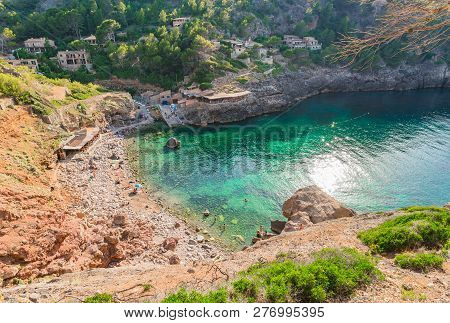 Idyllic Bay With At Coast Of Beach Cala Deia On Majorca, Spain Mediterranean Sea Island