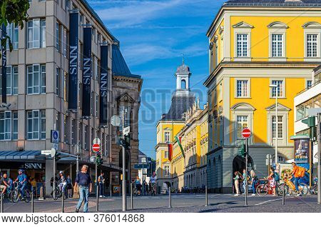 Bonn, Germany, August 23, 2019: People Walking Down Street In Front Of Electoral Palace Is Main Buil