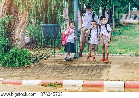 Kanchanaburi,thailand-july 2,2020:unidentified Elementary School Students Wear Face Mask To Prevent 