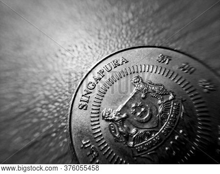 Mandalay/ Myanmar - June 30 2020: An Abstract Black And White Photo Of A Singapore Coin Focused On A