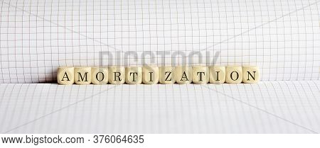 Amortization Word On Wooden Blocks. Amortize Concept.