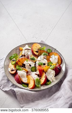 Fresh Summer Salad With Peaches And Buratta Cheese