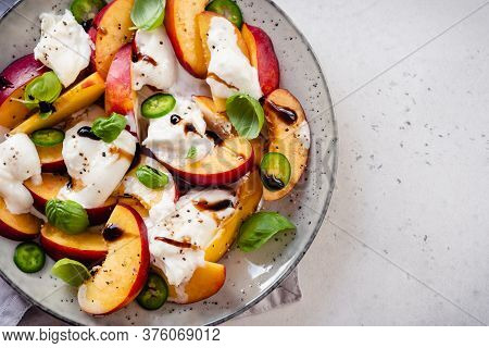 Fresh Summer Salad With Peaches And Buratta Cheese