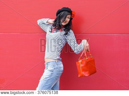 Young Woman In Modern French Style, Wear In Jeans And Jemper, Hat Beret. Casual Fashionable Style Fo