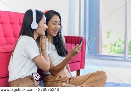 Asian Lesbian Love Couple Daily Lifestyle. Indoor Activity Together At Home. Pride And The Lgbt Comm