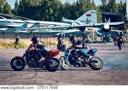 Moscow, Russia - 12 Jul 2020: Moto Rider Making A Stunt On His Motorbike. Stunt Motorcycle Rider Per