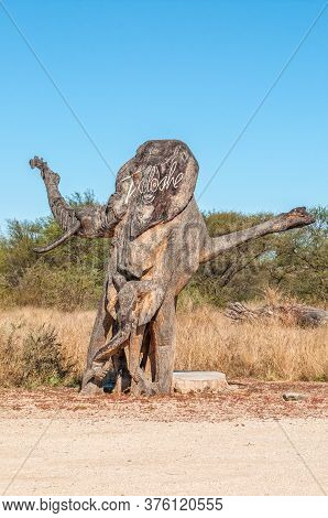 Omaruru, Namibia - May 31, 2011: A Wooden Sculpture Of An Elephant Used As Nameboard At Tikoloshe Af