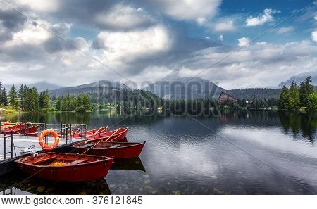 Wonderful Atmospheric Landscape. Awesome View On Strbske Pleso Mountains Lake. High Tatras. Slovakia