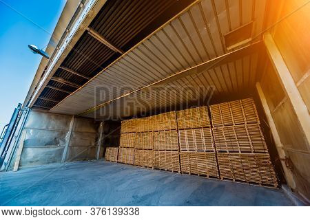 Lumber Ready For Loading Into A Dry Kiln. Wood Drying In Containers