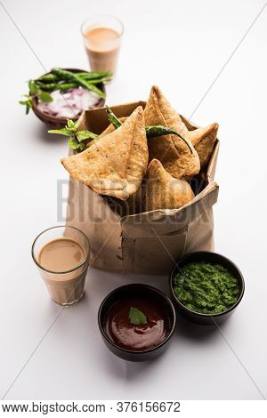 Samosa snack Is An Indian Deep Fried Pastry With A Spiced Filling Usually Made With Potatoes, Spices