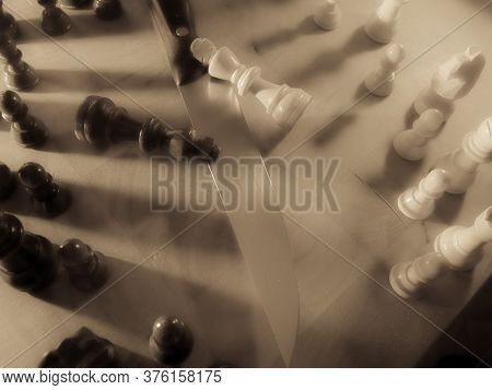 Chess Pieces And Knife