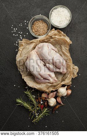 Raw Quail Meat On Kitchen, Cooking Gourmet Bird. Healthy Diet Recipe.