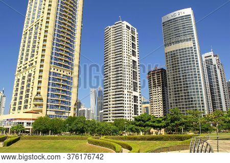 Dubai / Uae - October 15, 2019: View Of Jumeirah Lakes Towers Skyscrapers And Park During Day. Resid