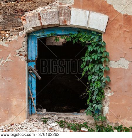 Close Up Of Old Damaged Abandoned House. Window Without Glass.