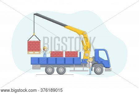 Construction Concept. Crane Driver And Worker Work Together. Manipulator Crane Unloads Bricks On Pal