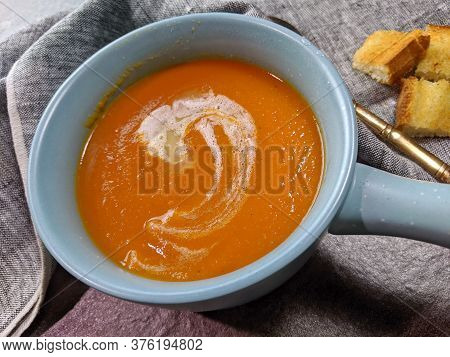 Homemade Tomato Carrot Soup In A Bow Made With Frsh Tomatoes.