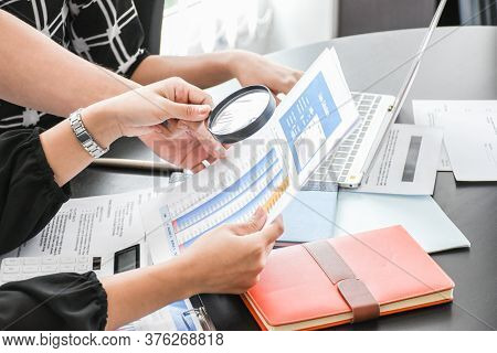 Employer Or Boss Is Interviewing For Jobs And Positions. Woman Sitting Smiling While Submitting A Re