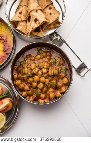 Indian Veg Lunchbox For Office Of Workplace With Chole, Dal Fry Rice And Chapati