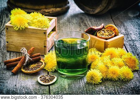 Cup Of Healthy Decoction Of Dandelions. Therapeutic Drink. Phytotherapy. Retro Tinted.