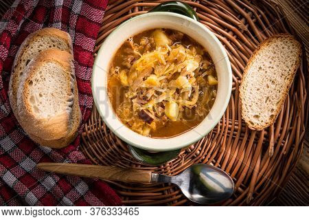 Traditional Russian Sour Cabbage Soup On Wicker Napkin. Top View.
