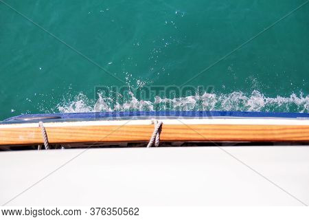 Turbulence Made By Foam Of Sea Water From A High-speed Yacht On Surface Of Sea. Blue Sea Waves With 