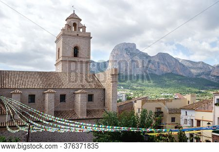 Detail Of The Church Of Polop De Marina With Rocky Mountainrange, Costa Blanca, Spain