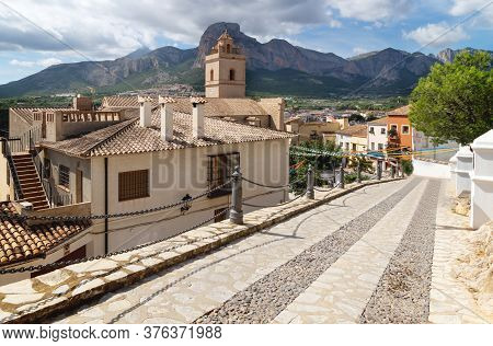 Church Of Polop De Marina With Rocky Mountainrange, Costa Blanca, Spain