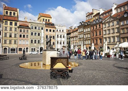 Polish People Wearing Retro Clothes Playing Antique Instrument Music Box Mobile For Show Travelers A