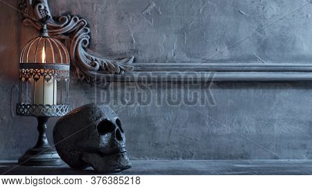 Mystical Halloween Still-life Background. Skull, Candlestick With Candles, Old Fireplace. Horror And