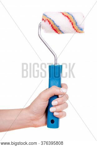 Hand With Striped Wool Paint Roller, Home Decoation And Improvement. Isolated On White Background.
