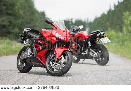 Krasnoyarsk, Russia - June 30, 2020: Two Red And Black Sportbike Honda Cbr 600 Rr 2005 Pc37.