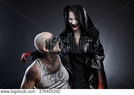 Mad Dirty Man And Scary Woman With Blood Hands