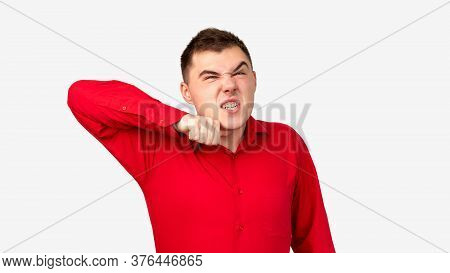 Furious Man Portrait. Violence Anger. Aggressive Guy In Red Shirt Threatening To Cut Throat Isolated