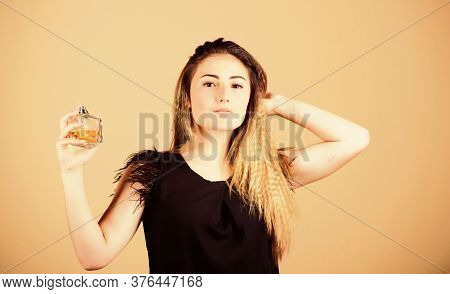 Born To Rule. Girl With Bottle Of Perfume. Beauty Product. Woman With Bottle Of Perfume. Girl Applyi