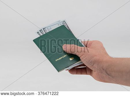 Green Passport On A White Background