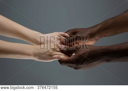 Supporting Hands. Racial Tolerance. Respect Social Unity. African And Caucasian Hands Gesturing On G