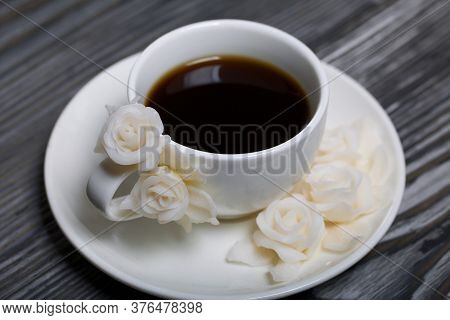 A Cup Of Black Coffee In A Vintage Cup Decorated With Polymer Clay Roses. Cup On A Saucer.