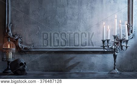 Mystical Halloween Still-life Background. Skull, Candlestick With Candles, Old Fireplace. Horror And