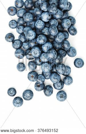 Tasty Blueberries Fruit Are Scattered On A White Background.