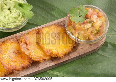 Patacón Fried Flattened Pieces Of Green Plantain (tostón, Tachino)