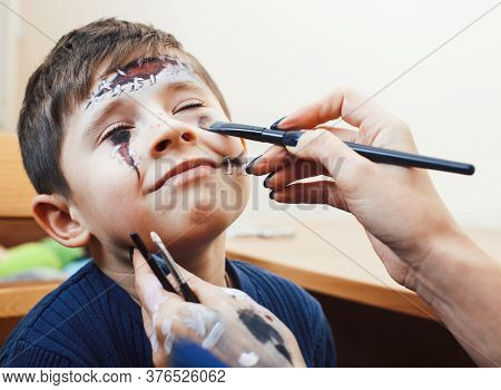 Little Cute Child Making Facepaint On Birthday Party, Zombie Apocalypse Facepainting, Halloween Prep