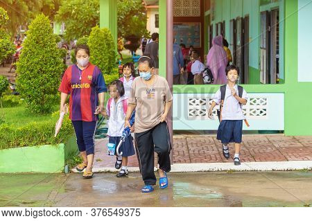 Kanchanaburi,thailand-july 2,2020:thai Students Wear Various Medical Masks To Prevent Themselves Fro