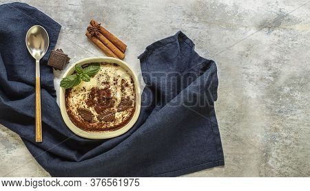 Phirni - Sweet Rice Pudding - Traditional Punjabi Sweet Dish With Cinnamon And Chocolate. Copy Space