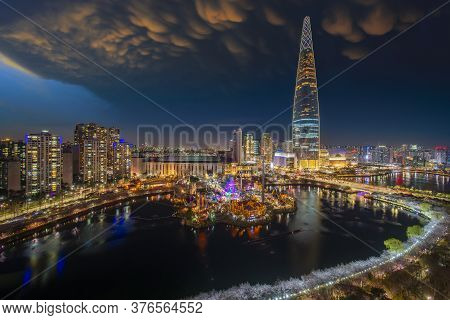 Top View Of Sakura Park, Night City And Building In Seoul City, South Korea