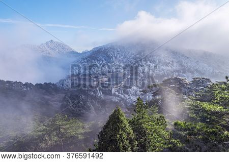 Clouds Above The Peaks And Hotels Of Huangshan National Park.