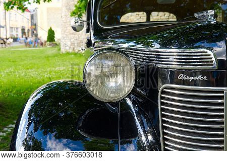 Haapsalu, Estonia - 12.07.2020 : Retro Cars In Haapsalu. Closeup Of Black Retro Car Chrysler Royal.