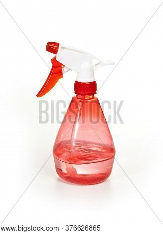Red Plastic Spray Bottle On White Background